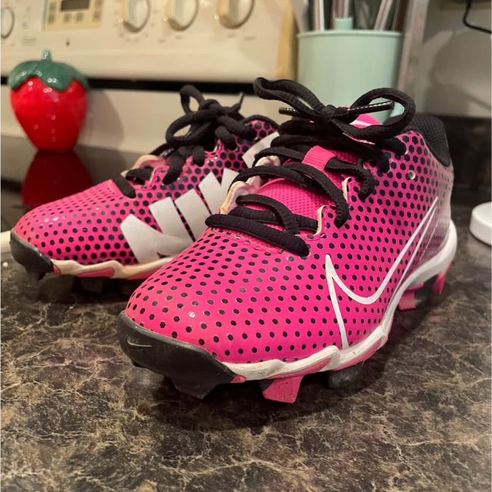 Nike Pink and Black Sneakers with Bold Design